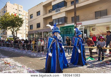 LIMASSOL, CYPRUS - FEBRUARY 26: Grand Carnival Parade - an unidentified people of all ages , gender and nationality in colorful costumes during the street carnival, February 26, 2017 in Limassol, Cyprus.