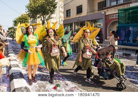LIMASSOL, CYPRUS - FEBRUARY 26: Grand Carnival Parade - an unidentified people of all ages , gender and nationality in colorful costumes during the street carnival, February 26, 2017 in Limassol, Cyprus.