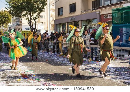 LIMASSOL, CYPRUS - FEBRUARY 26: Grand Carnival Parade - an unidentified people of all ages , gender and nationality in colorful costumes during the street carnival, February 26, 2017 in Limassol, Cyprus.