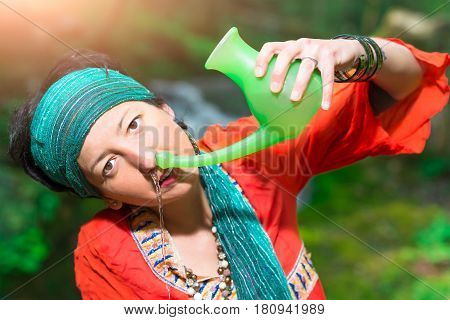 Jala Neti Nasal Irrigation With A Woman In Nature