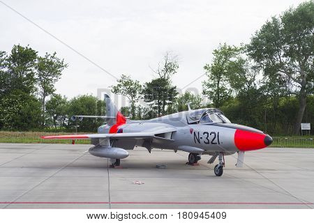 LEEUWARDEN NETHERLANDS - JUNI 10 2016: Hawker Hunter T.8C G-BWGL/N-321 fighter at the air force days in Leeuwarden