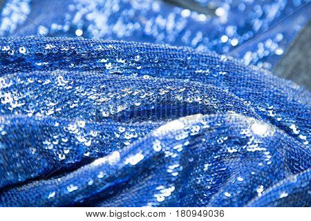 Sequins close-up macro. Shiny texrure cloth. Decoration