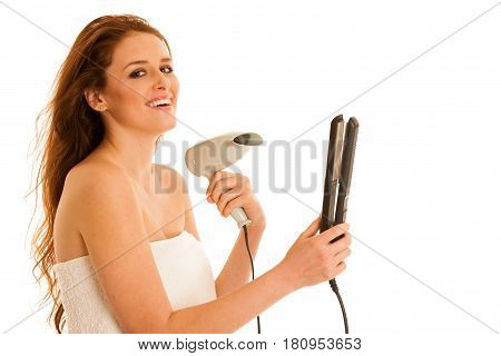 Beautiful Young Woman Holds Hair Brush And Blow Dryer Isolated Over White Bavkground