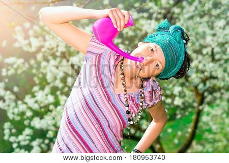 Jala Neti Nasal Irrigation With A Woman Who Practice In Spring Nature