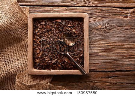 Bancha tea texture on wooden aged background