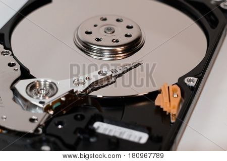 hard disk drive inside. magnetic head magnetic surface of the disk