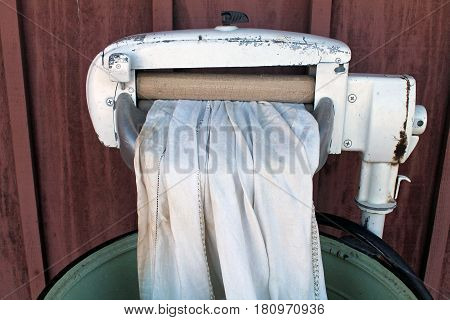 Antique Wringer Washing Machine with White Linen Cloth
