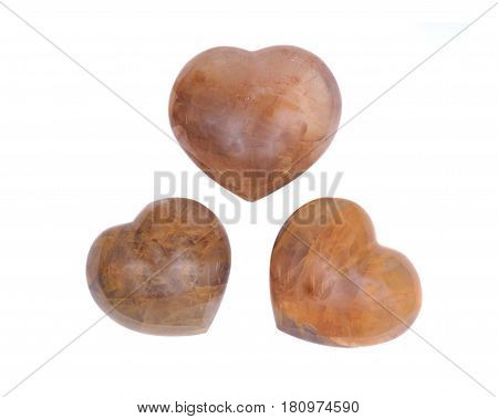 Golden healer quartz heart isolated on white background