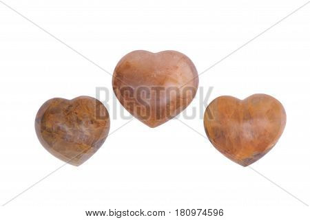 Golden healer quartz heart isolated on white background