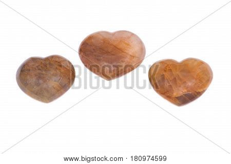 Golden healer quartz heart isolated on white background