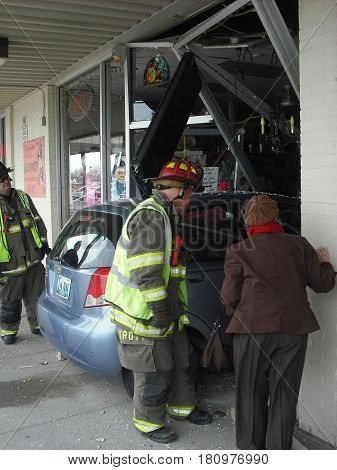 OCTOBER 2, 2013. CASPER, WY.  CIRCA:  Old female driver was confused and drove her car into a store in the shopping mall.