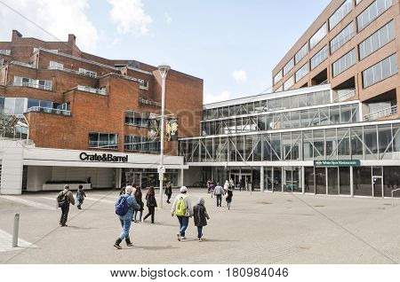 April 11 2017-People walking towards the entrance of the mall, Oakridge Center Vancouver,BC Canada.