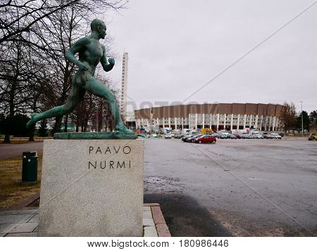 HELSINKI - JANUARY 2: Paavo Nurmi statue in front the Olimpic stadium on January 2 2017 in Helsinki Finland.