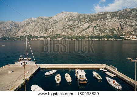 Prcanj, Montenegro The Bay of Kotor. Fishing boats on the dock.