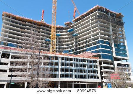 The construction of a skyscraper on site