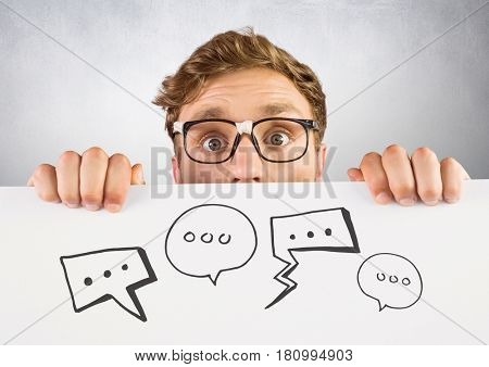 Digital composite of Man holding card with speech bubble graphics drawings