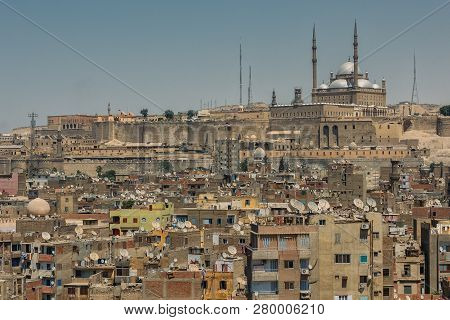 Old Cairo Cityscape With View On The Citadel And Alabaster Mosque On Top. Egypt
