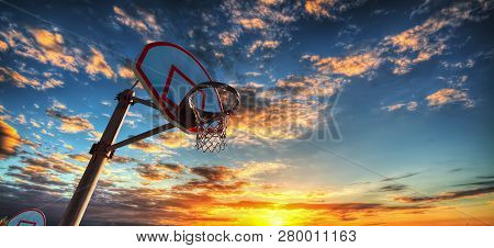 Basketball Hoop Under A Colorful Sky In Laguna Beach, Orange County. Southern Calfornia, Usa