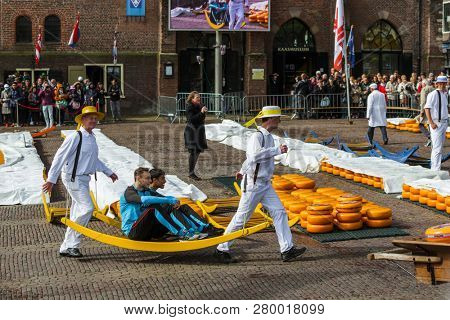 Alkmaar, Netherlands - April 28, 2017: Cheese carriers at traditional cheese market.
