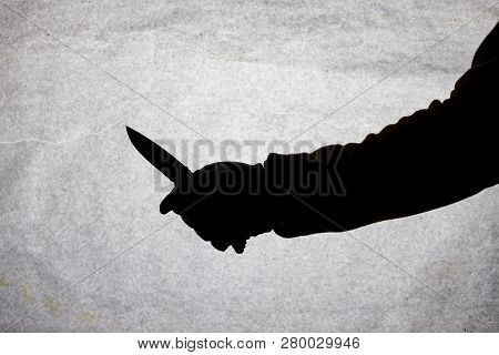 The Knife In The Hand Of Men Who Is Ready To Attack His Victim. Breaking The Law And Crime. Attack W