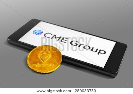 Slovenia - December 16, 2018: Cme Group Logo On A Mobile Device With Ethereum Coin