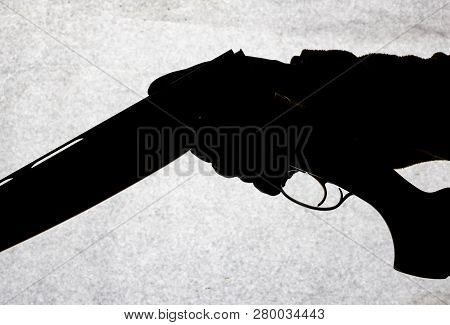 Classic Double-barrell Smooth-bore Hunting Rifle Isolated On White Background In Man Hand