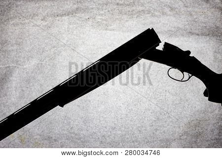 Classic Double-barrell Smooth-bore Hunting Rifle Isolated On White Background In Man Hand
