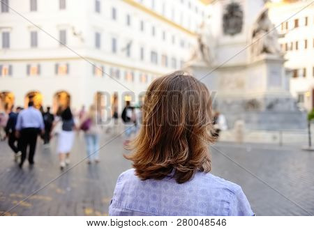 Brescia, Italy - May 14, 2017:young Woman Walks On Square In Rome. Toureism And Travel.