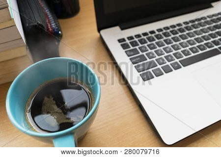 Coffee Cup On Table Wood With Bulr Labtop And Book
