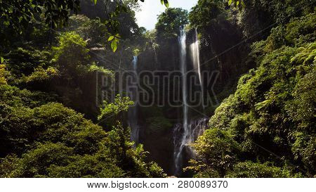 Waterfall In Green Rainforest. Triple Tropical Waterfall Sekumpul In Mountain Jungle. Bali, Indonesi