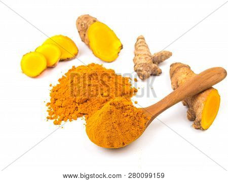 Turmeric Powder (curcuma) And Fresh Turmeric On White Background. Herbal