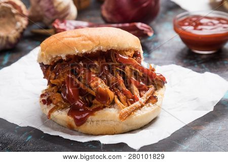 Burger with pulled pork, classic american meat sandwich