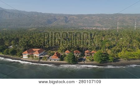 Aerial Seascape Luxury Hotel On Beach Background Mountainss In Tropical Resort. Bali, Indonesia, Tra