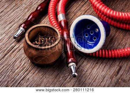 Smoking Hookah With Tobacco
