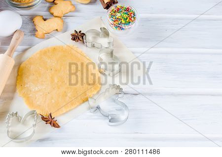 Easter Cooking Background, Dough And Indredients, Cuts For Cookies And Colored Sugar Décor For Bakin