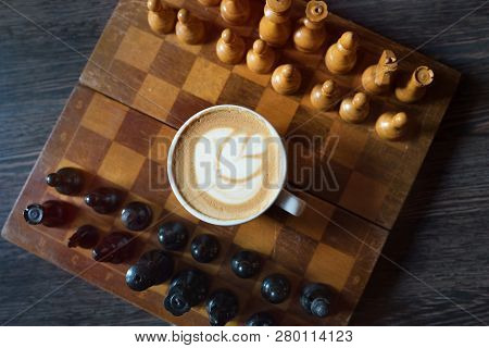 Cup Of Coffee On A Wooden Background. Top View