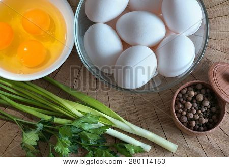 Still Life From Foods, Egg, Greenery, Pepper, On A Wooden Background. Kind From Above.