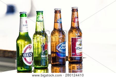 Great Stirrup Cay, Bahamas - January 08, 2016: Beer In Glass Bottles On Bar Counter. Alcohol, Bad Ha