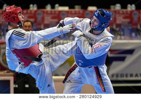ST. PETERSBURG, RUSSIA - OCTOBER 17, 2015: Taekwondo WTF junior teams match Russia vs Iran during the martial arts festival Baltic Sea Cup in Sibur Arena