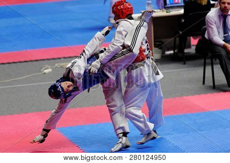 ST. PETERSBURG, RUSSIA - OCTOBER 17, 2015: Unidentified athletes compete in the individual taekwondo tournament during the martial arts festival Baltic Sea Cup in Sibur Arena