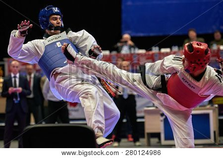 ST. PETERSBURG, RUSSIA - OCTOBER 17, 2015: Taekwondo WTF junior teams match Russia vs Iran during the martial arts festival Baltic Sea Cup in Sibur Arena