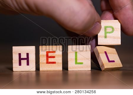 Hand Exchanges The Letter L From The Word Bright For A P, Giving The Word Help
