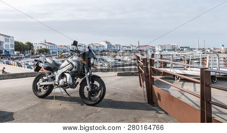Motorcycle Parked In Harbor Port Joinville On Yeu Island