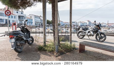 Motorcycle Parked In Harbor Port Joinville On Yeu Island