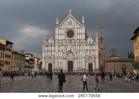 Italy, Florence - April 02 2017: The Front View Of Basilica Santa Croce Facade With Rainy Clouds On 