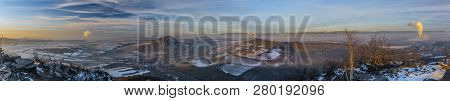 Panorama View Of Sunrise On Boren Hill Near Bilina Town In Winter Frosty Color Morning