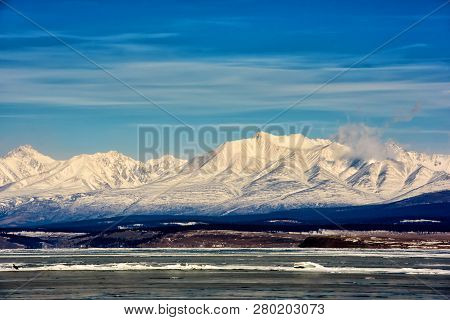 View Of Beautiful Drawings On Ice From Cracks On Surface Of Khubsugul Lake In Winter With Mountain, 