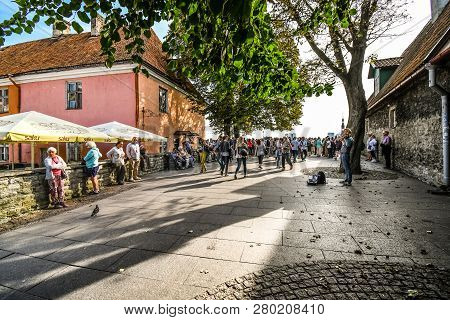 Tallinn, Estonia - September 8 2018: Tourists Line Up At The Wall Overlooking Old Town In The Upper 