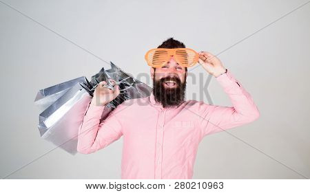 Profitable Deal. How To Get Ready For Your Next Vacation. Man Bearded Hipster With Lot Shopping Bags