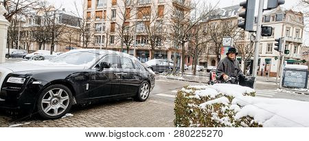 Strasbourg, France - Mar 18, 2018: Side View Of New Luxury Rolls-royce Limousine Black Silver Car On